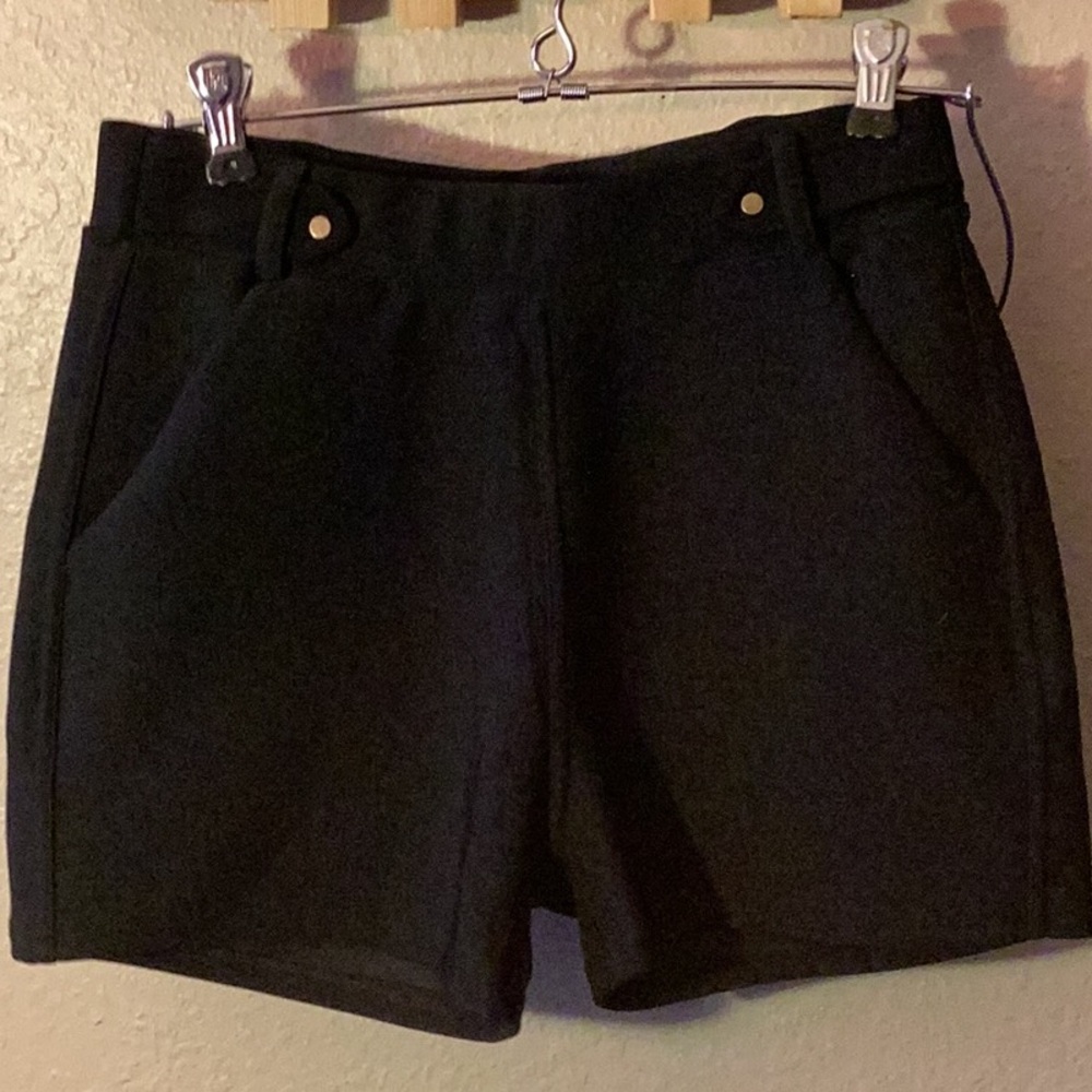 Fuego Moda cute stretchy black dress shorts with gold accents. Size L/XL. Elasti